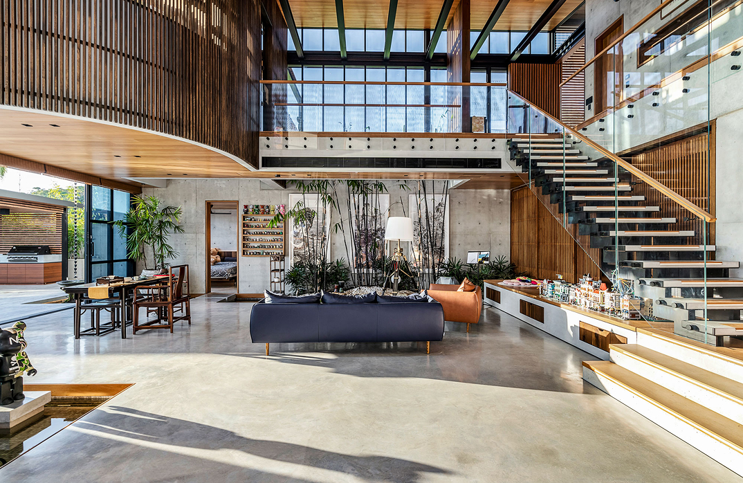 Seaforth Ultra Modern home's foyer; with clear glass, polished concrete and industrial steel beams