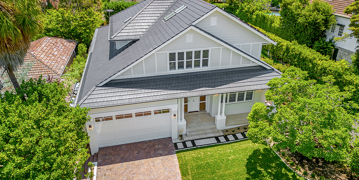 Overhead view of grey roofed house