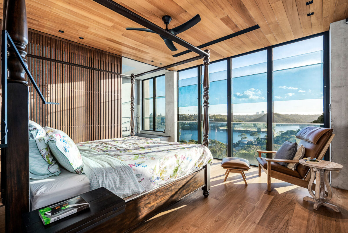 Seaforth Ultra Modern: wooden ceiling and joinery bedroom with uninterrupted water views