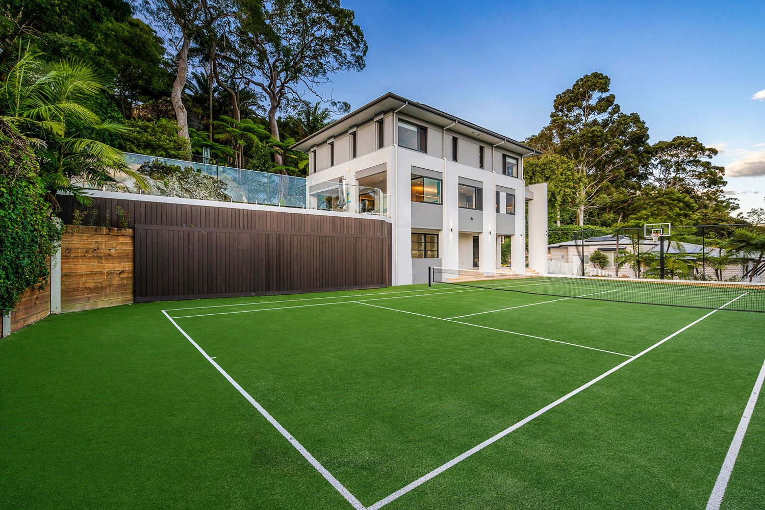 Northbridge Modern: View of house from tennis court