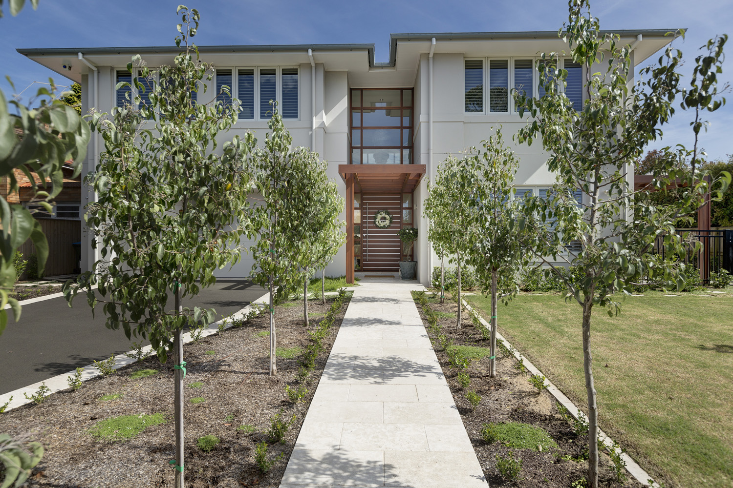 Turramurra Contemporary: front facade, tree-lined walkway to entrance