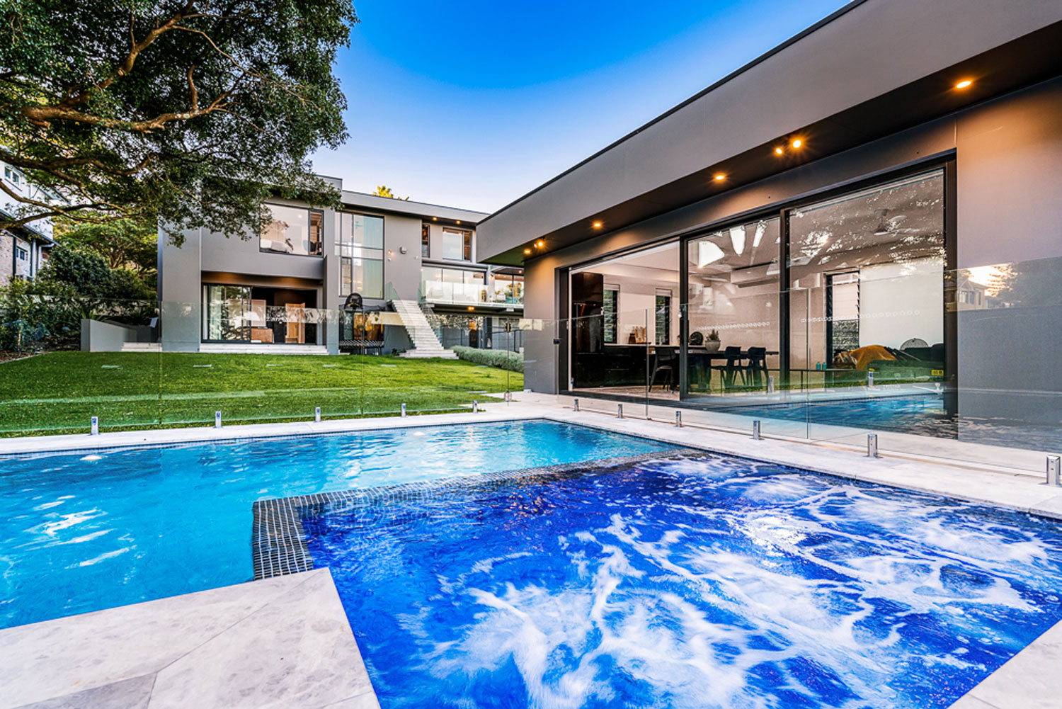 Northbridge Ultra Modern: view of pool cabana next to pool with spa section