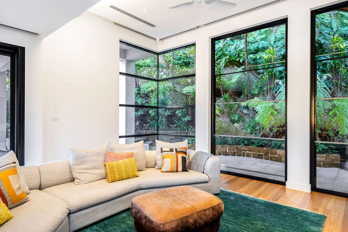 Northbridge Modern: view of tropical lush outdoors from living room