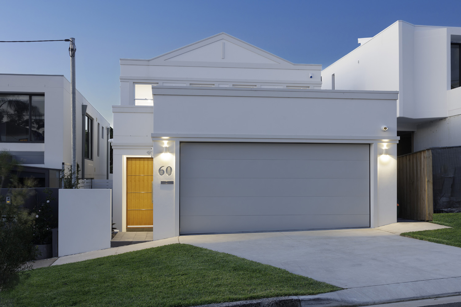 North Bondi Contemporary: modern front facade in light grey-neutrals and bright yellow front door