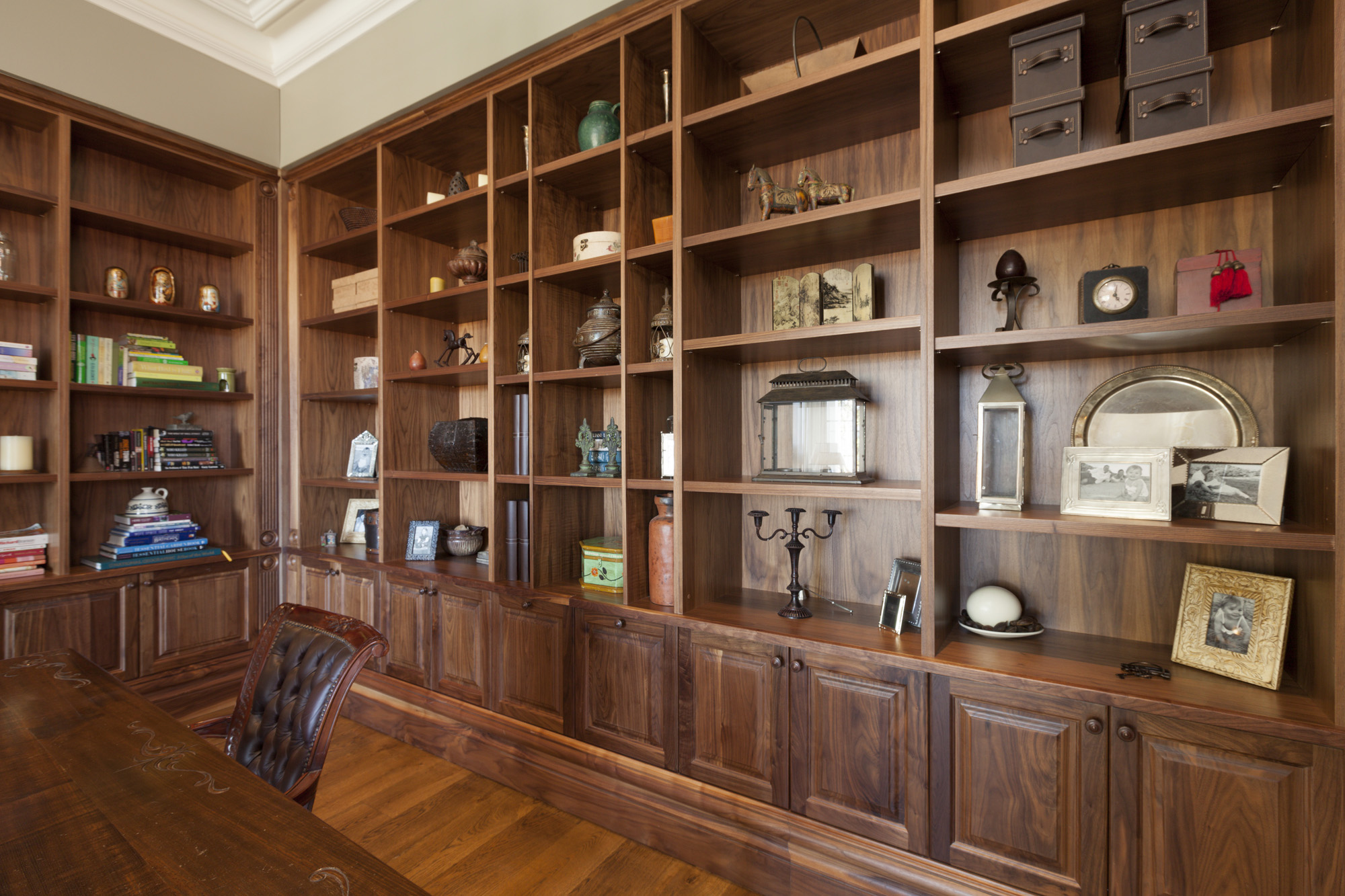 Seaforth Hamptons: built in wooden bookcases in study