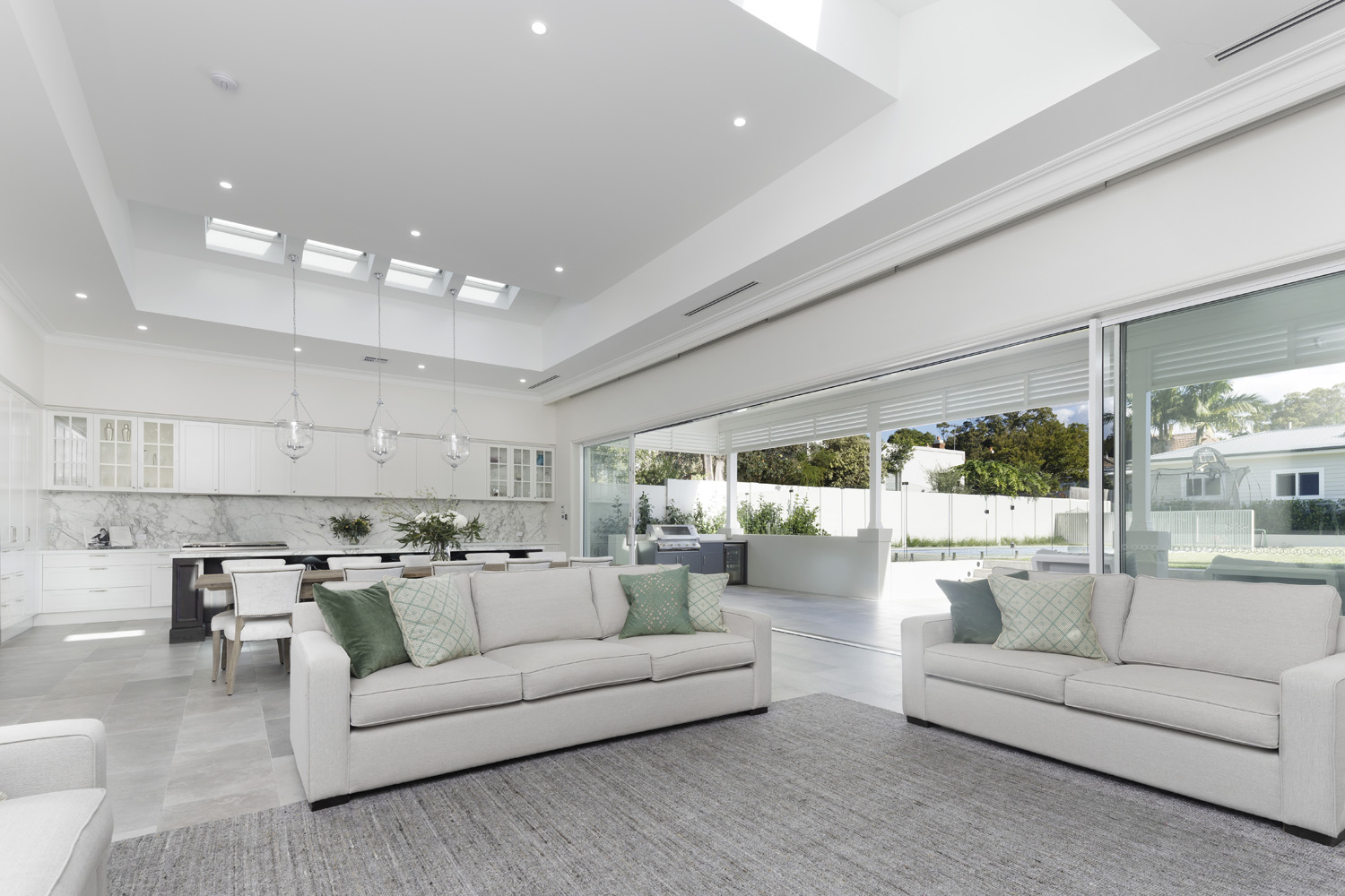 Willoughby Traditional Hamptons: spacious living area flowing to outdoor living